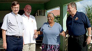 Elba Corina McLean gets a visit from Rev. Nicholas Sykes, Brian Pairaudeau (not pictured) of Love in Action and Bert Foster and Dr. Mark Laskin of the National Recovery Fund.